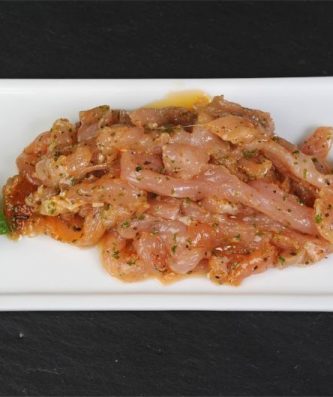 Emincé de volaille mariné aux herbes